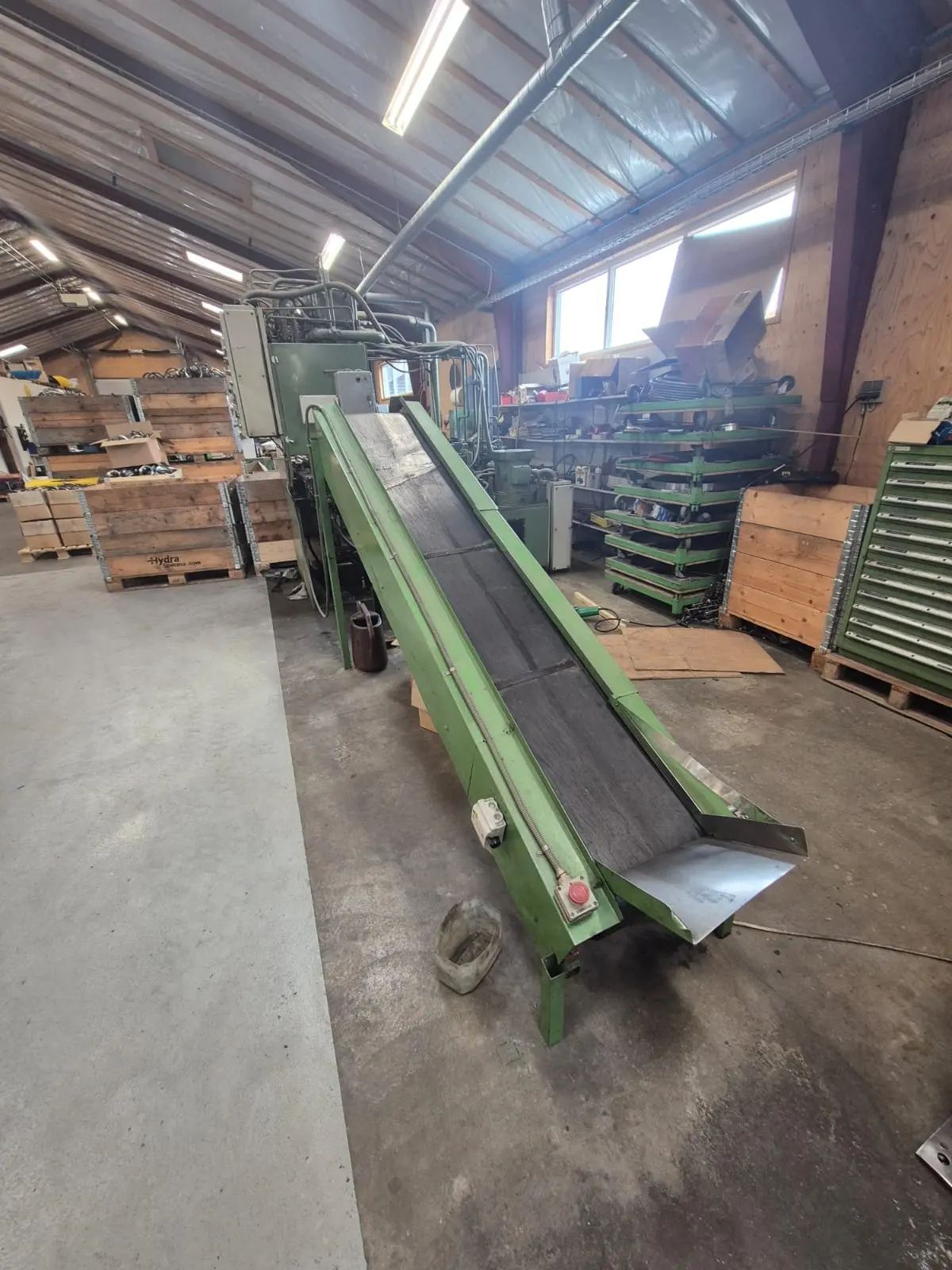 Industrial conveyor and machinery in a workshop