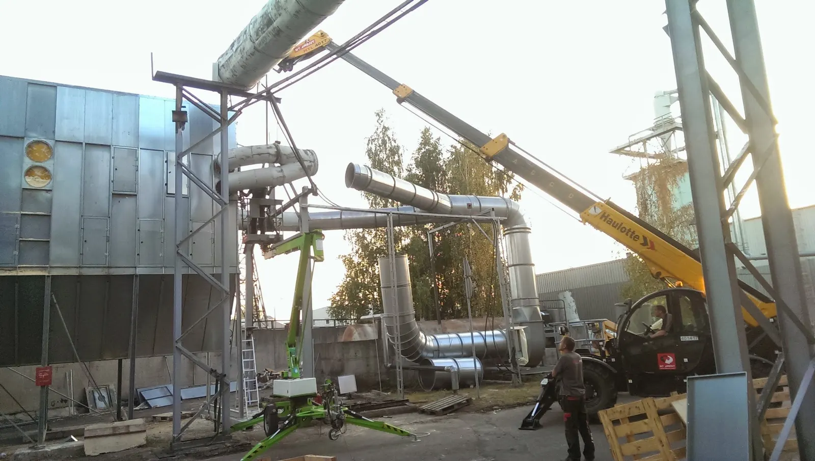 Ductwork installation with a crane and lifting platforms, Riga 2014