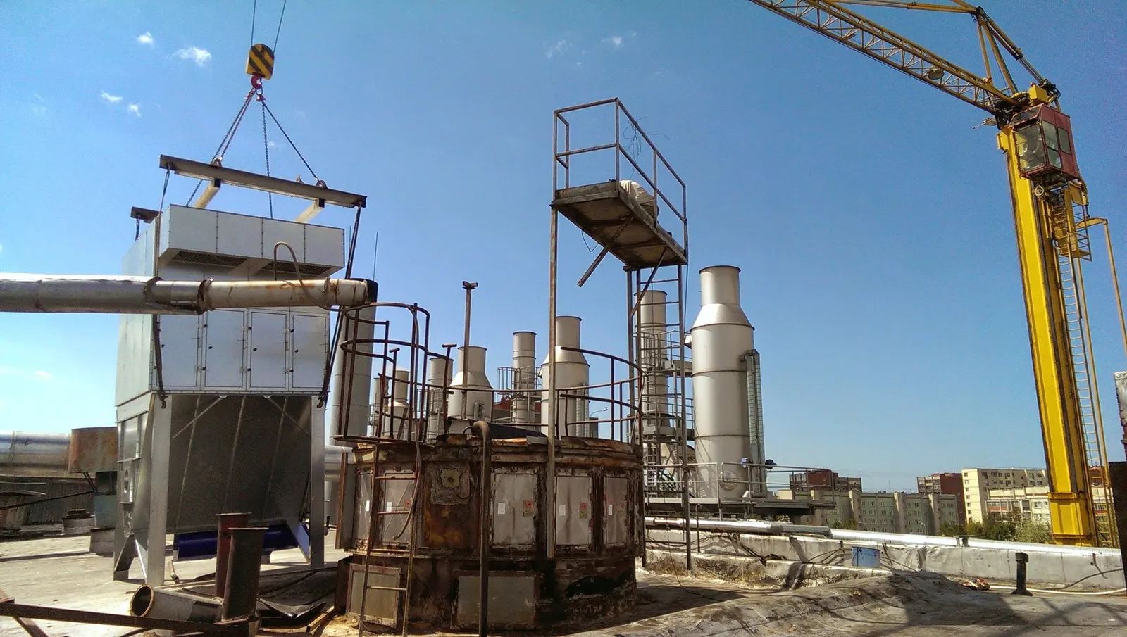 Dust extraction filter with an access platform during installation, Riga 2014